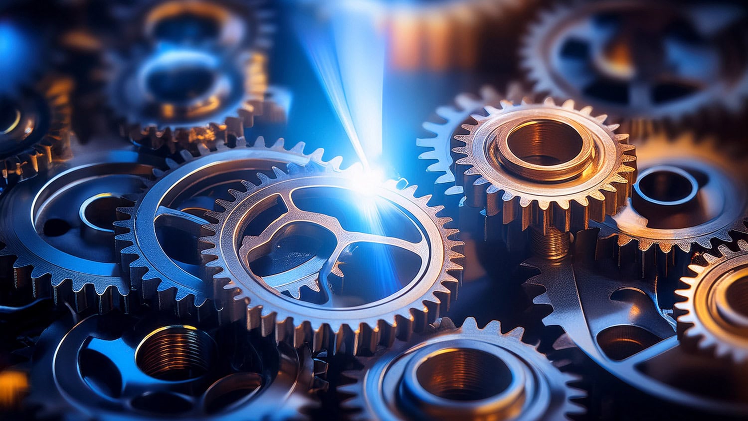 Engranajes metálicos en movimiento con tecnología de soldadura láser para soluciones industriales innovadoras.